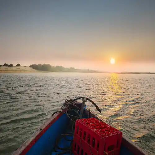 Boating experience on the river near WildDunes Eco Resort in Konark, Odisha