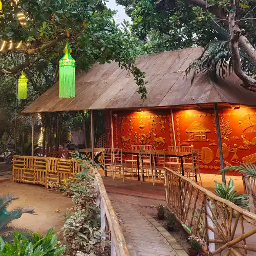 Outdoor entrance and seating area at WildDunes pet-friendly resort in Konark